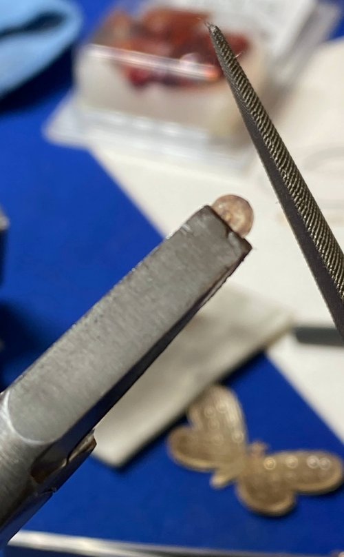 Susan LeGuyader's Butterfly Earrings - , Contemporary Wire Jewelry, Dapping, Dapping Jewelry, How To Punch Holes, Hole Punching, Punch A Hole, Texturing, Butane Torch, Soldering, Solder,  file down the rivet head to better fit the butterfly